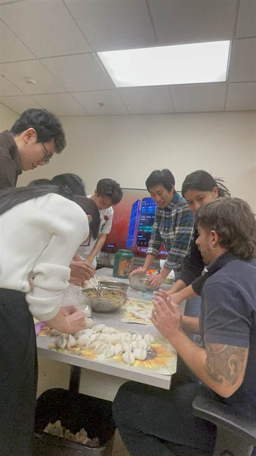 Lab members making dumplings for Spring Festival