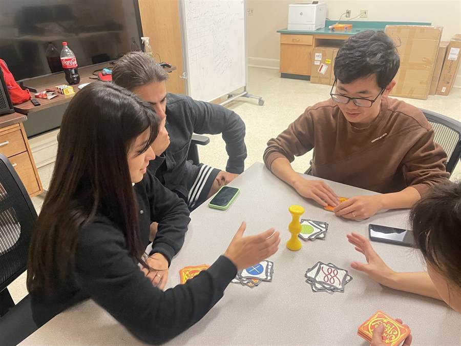 Lab members playing Jungle Speed